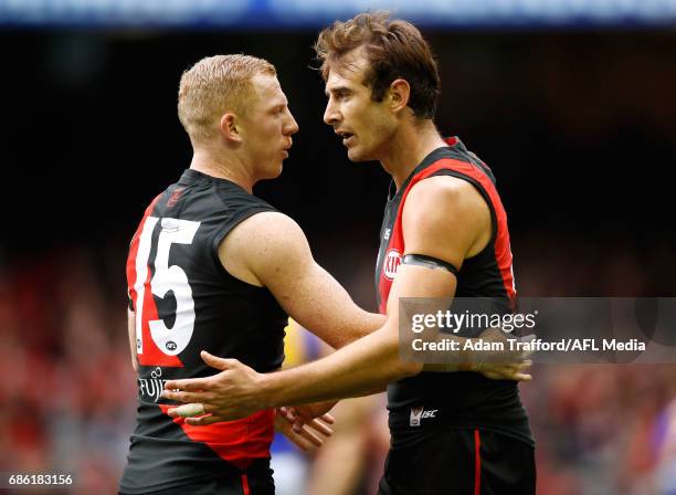 Jobe Watson of the Bombers speaks to Josh Green of the Bombers during the 2017 AFL round 09 match between the Essendon Bombers and the West Coast...