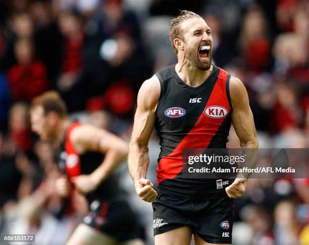 Cale Hooker of the Bombers celebrates a goal during the 2017 AFL round 09 match between the Essendon Bombers and the West Coast Eagles at Etihad...