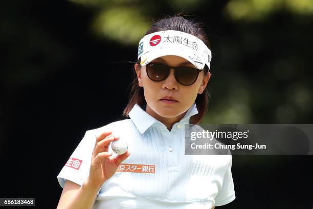 Teresa Lu of Taiwan reacts after a putt on the 9th green during the final round of the Chukyo Television Bridgestone Ladies Open at the Chukyo Golf...