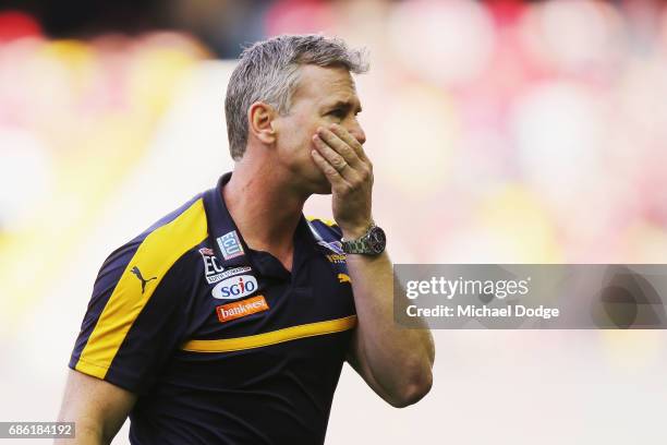 Eagles head coach Adam Simpson walks off at at three quarter time during the round nine AFL match between the Essendon Bombers and the West Coast...