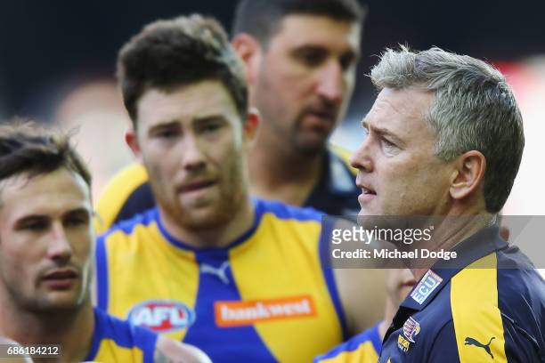 Eagles head coach Adam Simpson speaks to his players at three quarter time during the round nine AFL match between the Essendon Bombers and the West...