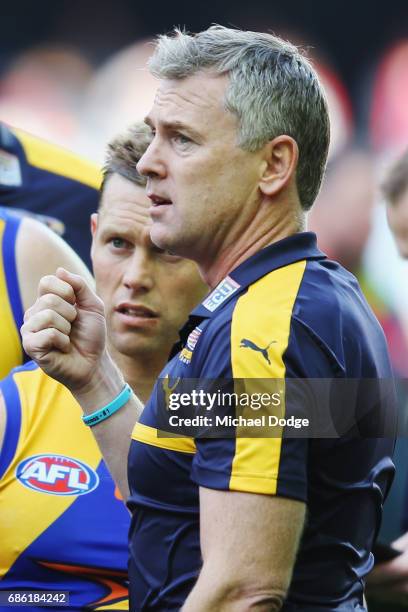 Eagles head coach Adam Simpson speaks to his players at three quarter time during the round nine AFL match between the Essendon Bombers and the West...