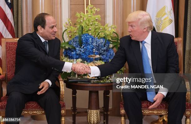 President Donald Trump and Egypt's President Abdel Fattah al-Sisi take part in a bilateral meeting at a hotel in the Saudi capital Riyadh on May 21,...