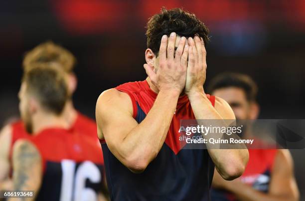 Christian Petracca of the Demons looks dejected after losing the round nine AFL match between the Melbourne Demons and the North Melbourne Kangaroos...