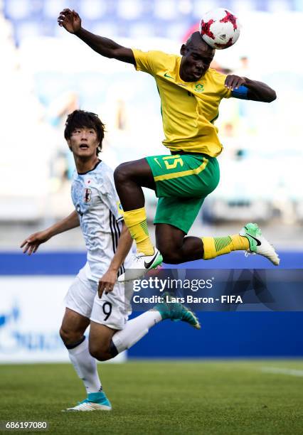 Koki Ogawa of Japan in action with Repo Malepe of South Africa during the FIFA U-20 World Cup Korea Republic 2017 group D match between South Africa...