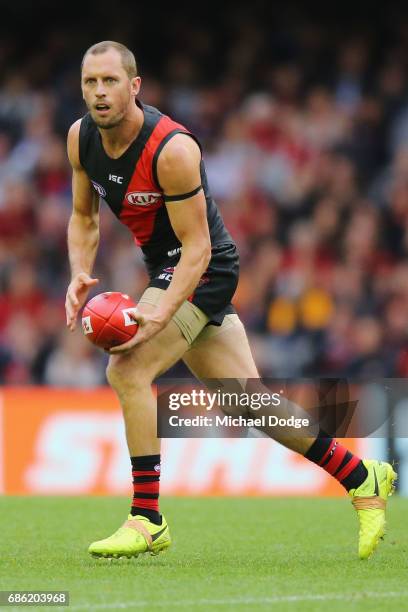 James Kelly of the Bombers looks upfield during the round nine AFL match between the Essendon Bombers and the West Coast Eagles at Etihad Stadium on...