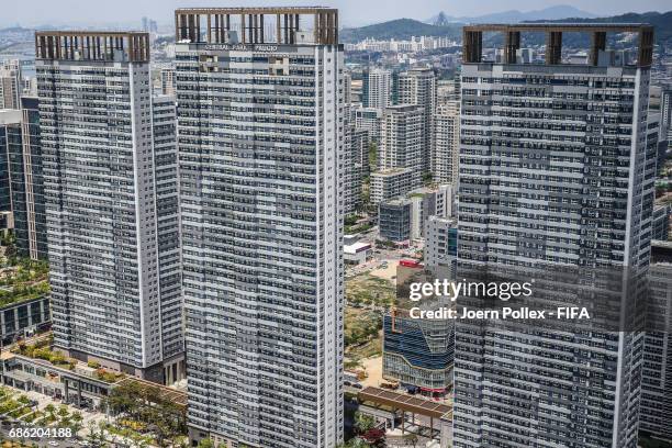 An aerial view of Songdo City, pictured through a window of Oakwood Premier Hotel on May 21, 2017 in Incheon, South Korea.