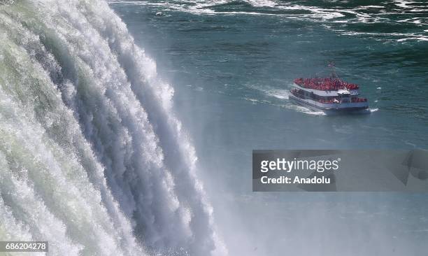 Long boat which carries the visitors is seen on Niagara Fall near Ontario River, in Canada, North America on May 08, 2017. Niagara Falls is one of...