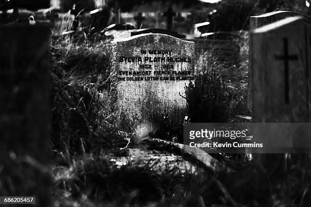 American poet Sylvia Plath's grave in St Thomas A Beckett Churchyard, Heptonstall, Yorkshire, United Kingdom, 26th August 2016. She was married to...