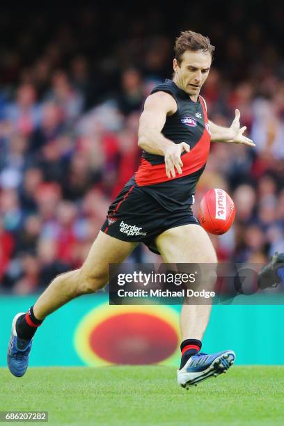 Jobe Watson of the Bombers kicks the ball during the round nine AFL match between the Essendon Bombers and the West Coast Eagles at Etihad Stadium on...