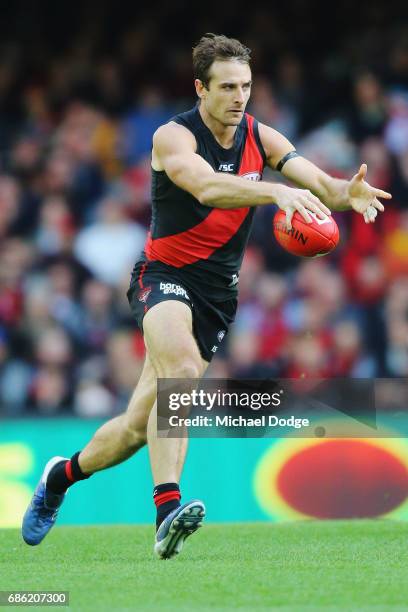 Jobe Watson of the Bombers kicks the ball during the round nine AFL match between the Essendon Bombers and the West Coast Eagles at Etihad Stadium on...