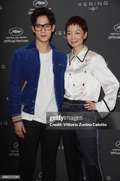 Actor Yang Yang and Xiao Xue attend Kering Talks Women In Motion At The 70th Cannes Film Festival at Hotel Majestic on May 21, 2017 in Cannes, France.