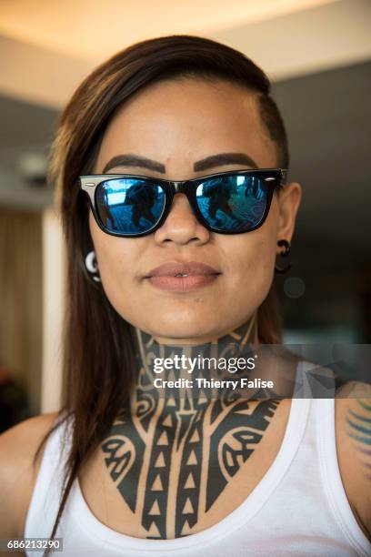 A young woman with her tattooed neck attends a tattoo workshop. News Photo - Getty Images A young woman with her tattooed neck attends a tattoo workshop. News Photo - Getty Images