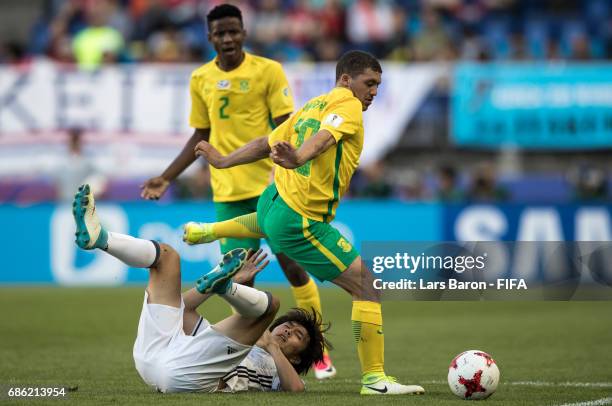 Koki Ogawa of Japan is challenged by Grant Margeman of South Africa during the FIFA U-20 World Cup Korea Republic 2017 group D match between South...