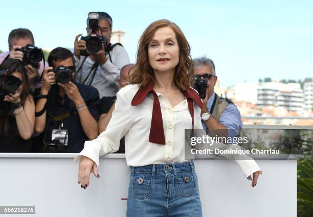 Actress Isabelle Huppert attends the "Claire's Camera " photocall during the 70th annual Cannes Film Festival at Palais des Festivals on May 21, 2017...