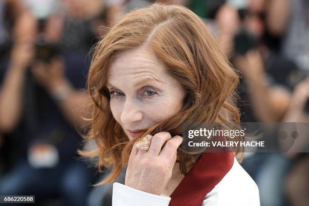 French actress Isabelle Huppert poses on May 21, 2017 during a photocall for the film 'Claire's Camera ' at the 70th edition of the Cannes Film...