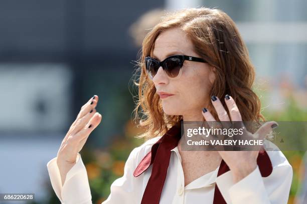 French actress Isabelle Huppert poses on May 21, 2017 during a photocall for the film 'Claire's Camera ' at the 70th edition of the Cannes Film...