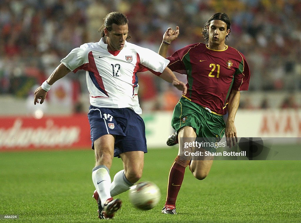 Nuno Gomes of Portugal and Jeff Agoos of USA