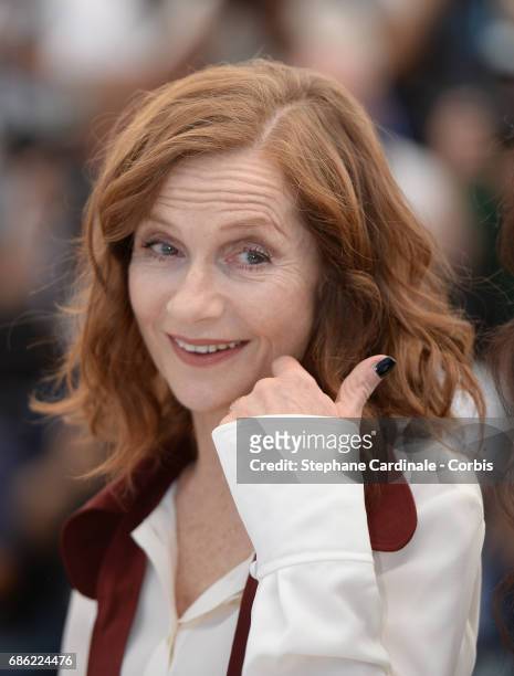 Actress Isabelle Huppert attends the "Claire's Camera " photocall during the 70th annual Cannes Film Festival at Palais des Festivals on May 21, 2017...