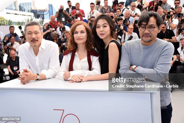 Director Hong SangSoo, Actresses Isabelle Huppert and Kim Minhee and a guest attend the "Claire's Camera " photocall during the 70th annual Cannes...