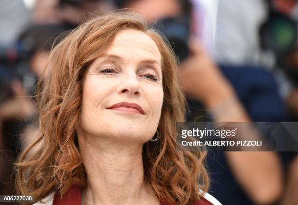 French actress Isabelle Huppert poses on May 21, 2017 during a photocall for the film 'Claire's Camera ' at the 70th edition of the Cannes Film...