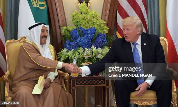 President Donald Trump and Kuwait's Emir Sheikh Sabah al-Ahmad al-Jaber al-Sabah take part in a bilateral meeting at a hotel in Riyadh on May 21,...