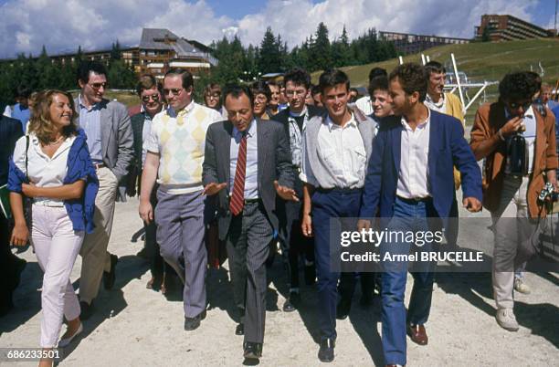 Michel Rocard surrounded by young supporters of his politics at Les Arcs, France, 6th September 1985. From left to right: Nathalie Soulie, ex wife of...