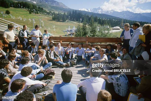Michel Rocard surrounded by young supporters of his politics at Les Arcs, France, 6th September 1985. From right to left : Nathalie Soulie, ex wife...