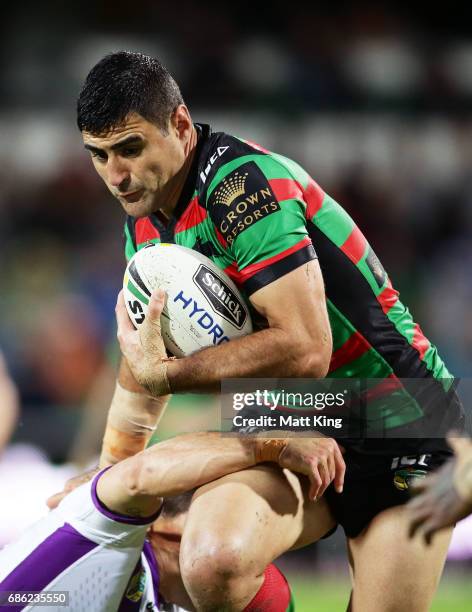 Bryson Goodwin of the Rabbitohs takes on the defence during the round 11 NRL match between the South Sydney Rabbitohs and the Melbourne Storm at nib...