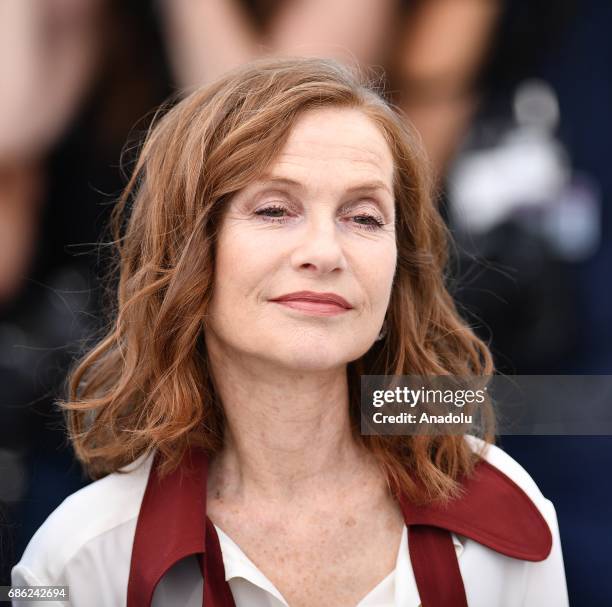 French actress Isabelle Huppert poses during a photocall for the film Claires camera photocall out of competition at the 70th annual Cannes Film...