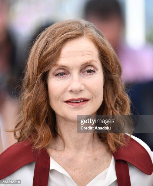 French actress Isabelle Huppert poses during a photocall for the film Claires camera photocall out of competition at the 70th annual Cannes Film...