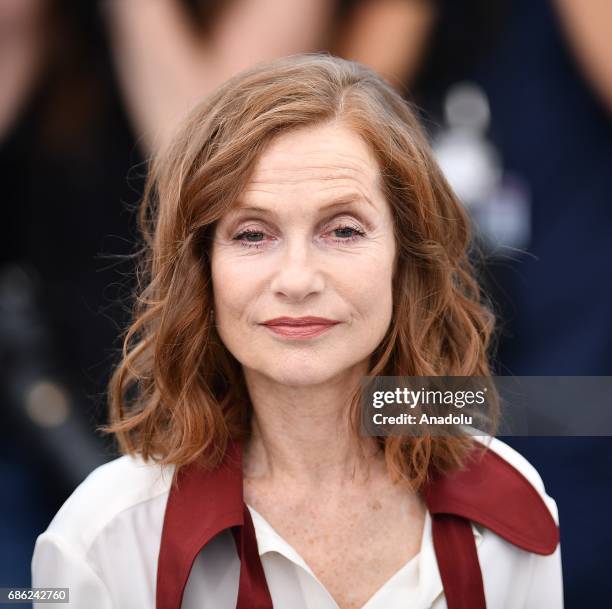 French actress Isabelle Huppert poses during a photocall for the film Claires camera photocall out of competition at the 70th annual Cannes Film...