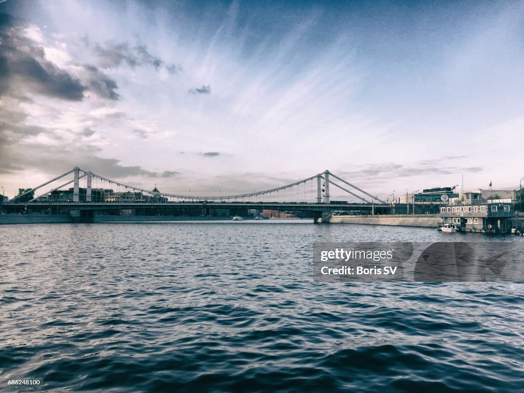 View of the Krymsky Bridge and Gorky Park from the middle of Moskva river, Moscow, Russia