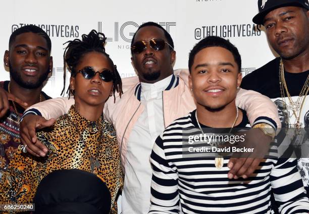 Singer/songwriter Gizzle and recording artist Sean "Diddy" Combs aka Puff Daddy and Jessie James Combs attend the Light Nightclub at the Mandalay Bay...