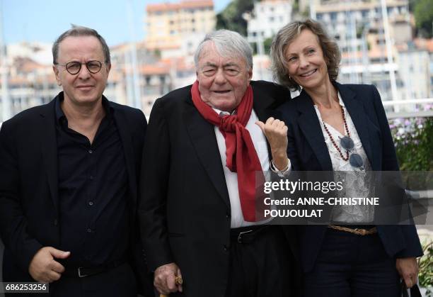 French producer Francois Margolin, French director Claude Lanzmann and photographer Iris van der Waard pose on May 21, 2017 during a photocall for...