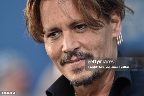 Actor Johnny Depp arrives at the premiere of Disney's 'Pirates of the Caribbean: Dead Men Tell No Tales' at Dolby Theatre on May 18, 2017 in...