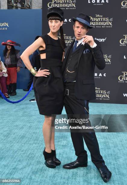 Actor Alexander Scheer and designer Esther Perbandt arrive at the premiere of Disney's 'Pirates of the Caribbean: Dead Men Tell No Tales' at Dolby...