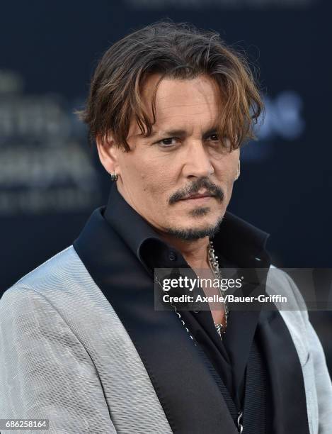 Actor Johnny Depp arrives at the premiere of Disney's 'Pirates of the Caribbean: Dead Men Tell No Tales' at Dolby Theatre on May 18, 2017 in...