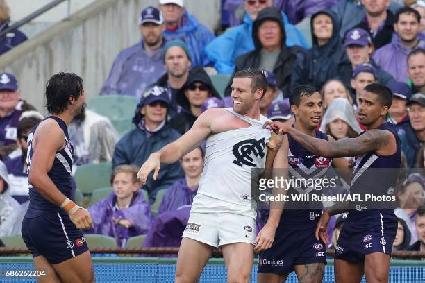 Sam Docherty of the Blues is involved in a melee with Brady Grey of the Dockers during the round nine AFL match between the Fremantle Dockers and the...