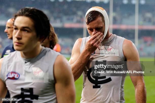 Sam Docherty of the Blues leave the field after the teams defeat during the round nine AFL match between the Fremantle Dockers and the Carlton Blues...