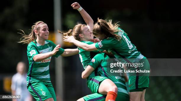 Cindy Koenig and team mates celebrate their teams first goal of Verena Volkmer during the Second Bundesliga Nord match between Werder Bremen and VfL...