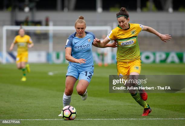 Georgia Stanway of Manchester City Women and Nicola Cousins of Yeovil Town Ladies in action during the WSL Spring Series Match between Manchester...