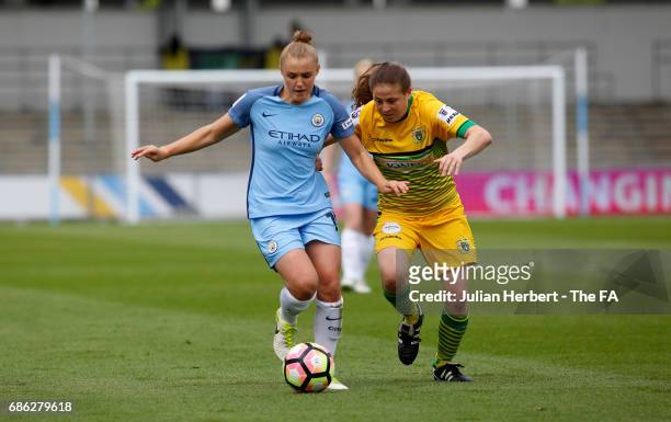 Georgia Stanway of Manchester City Women and Annie Heatherson of Yeovil Town Ladies in action during the WSL Spring Series Match between Manchester...