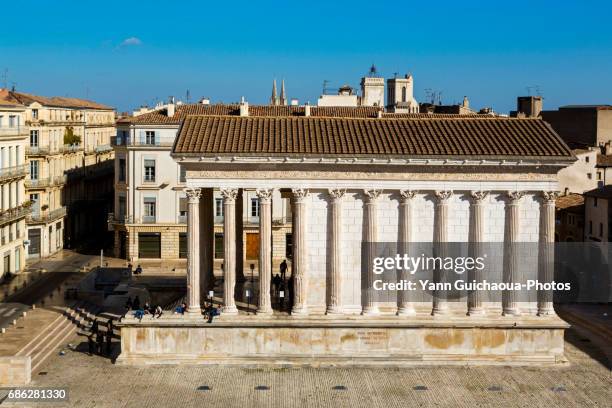 the roman temple named maison carree, nimes, gard,languedoc roussillon, france - nîmes fotografías e imágenes de stock