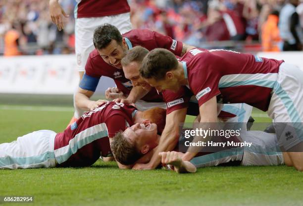 Dillon Morse of South Shields clebrates scoring his teams second goal with teammates during the Buildbase FA Vase Final between South Shields and...