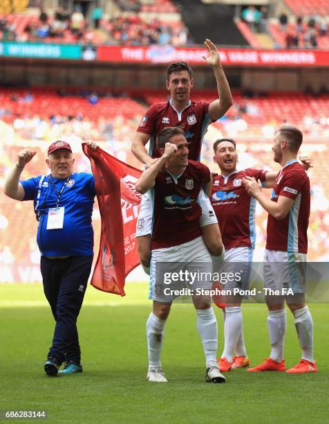 The South Shields team celebrate after The Buildbase FA Vase Final between South Shields and Cleethorpes Town at Wembley Stadium on May 21, 2017 in...