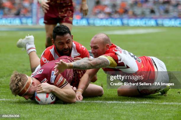 Huddersfield giants Adam O Brien scores his late try during day two of the Betfred Super League Magic Weekend at St James' Park, Newcastle.