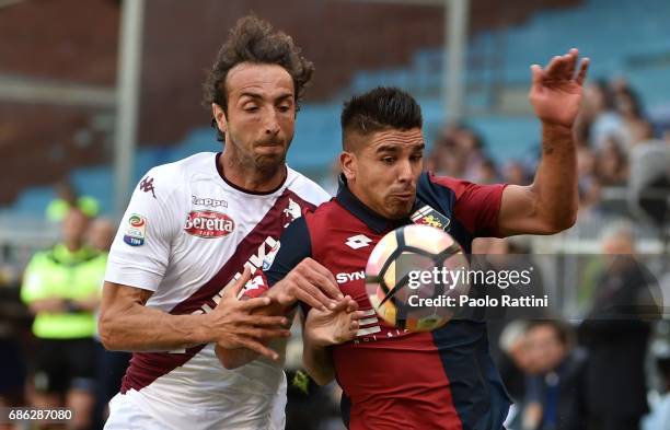 Giovanni Simeone of Genoa and Emiliano Moretti of Torino during the Serie A match between Genoa CFC and FC Torino at Stadio Luigi Ferraris on May 21,...