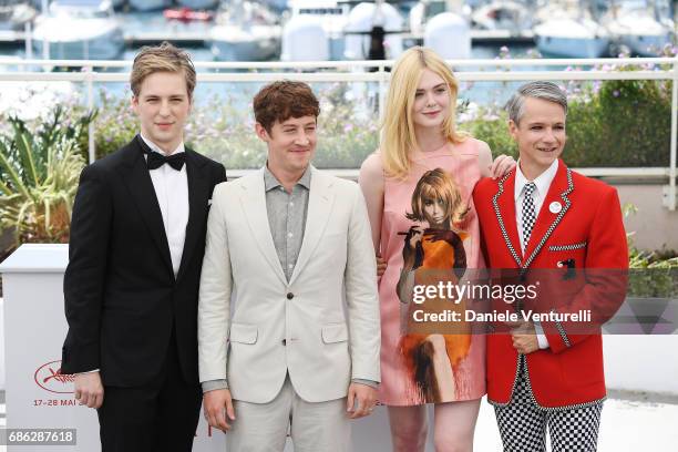 Actors AJ Lewis, Alex Sharp, Elle Fanning and director John Cameron Mitchell attend the "How To Talk To Girls At Parties" photocall during the 70th...