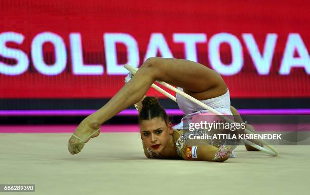 Silver medalist Russia's Aleksandra Soldatova performs with her hoop in Papp Laszlo Arena of Budapest on May 21, 2017 during the apparatus final day...